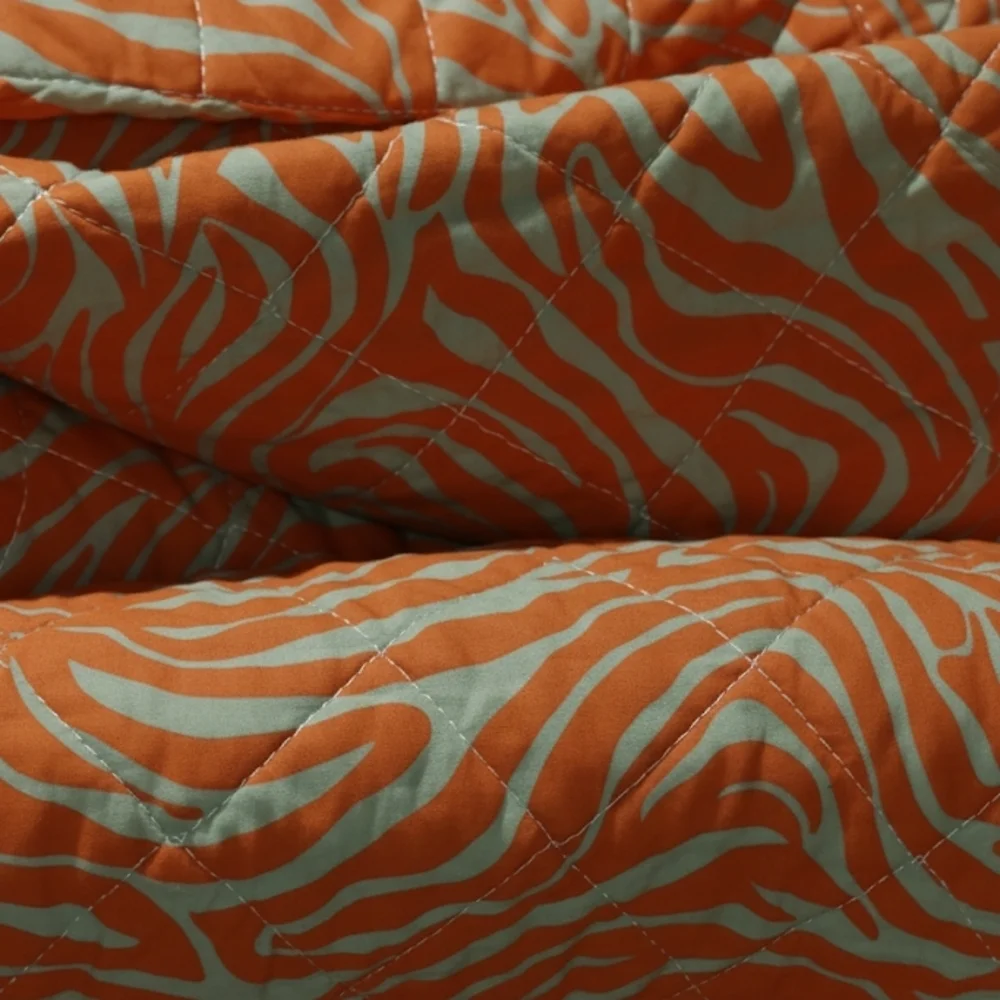 Elegant Tan And Orange Patterned Throw